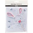 Mini creative kit with bunny ears and bow on a white background