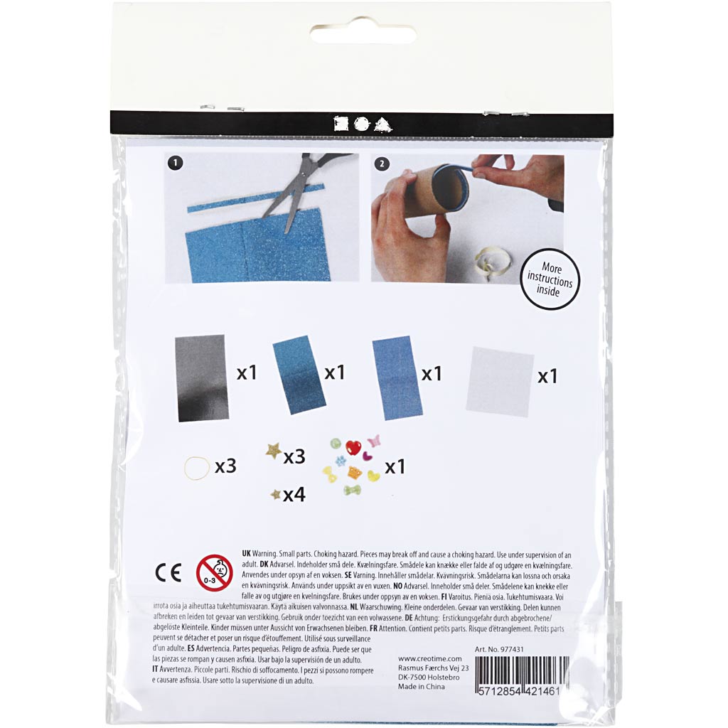 Package of craft items with scissors, stamps, and a bottle opener on a white background.