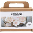 Decoupage kit packaging with decorative papers and tools on a white background