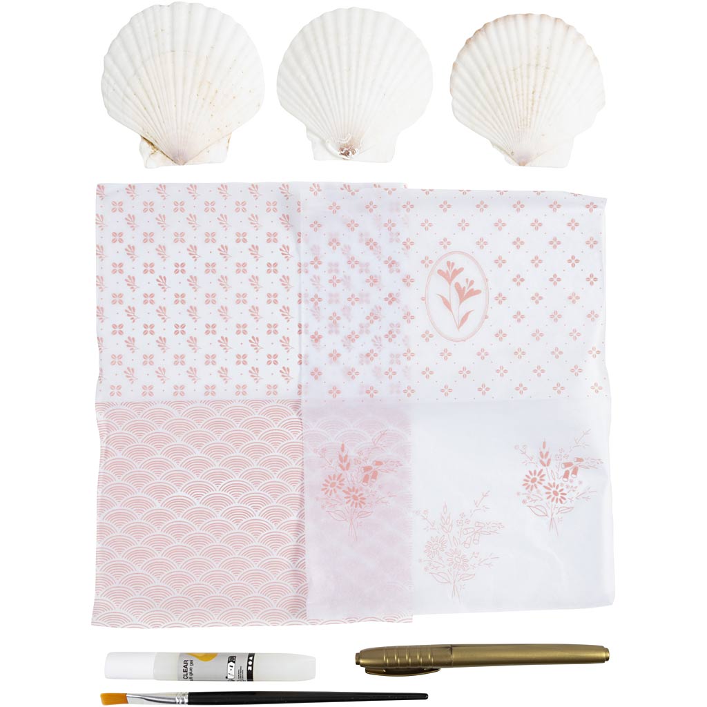 Decorative decoupage kit with floral patterns, three seashells, and a paintbrush on a white background