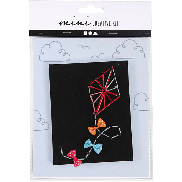 Mini creative kit packaging with colorful bow decorations on a black background