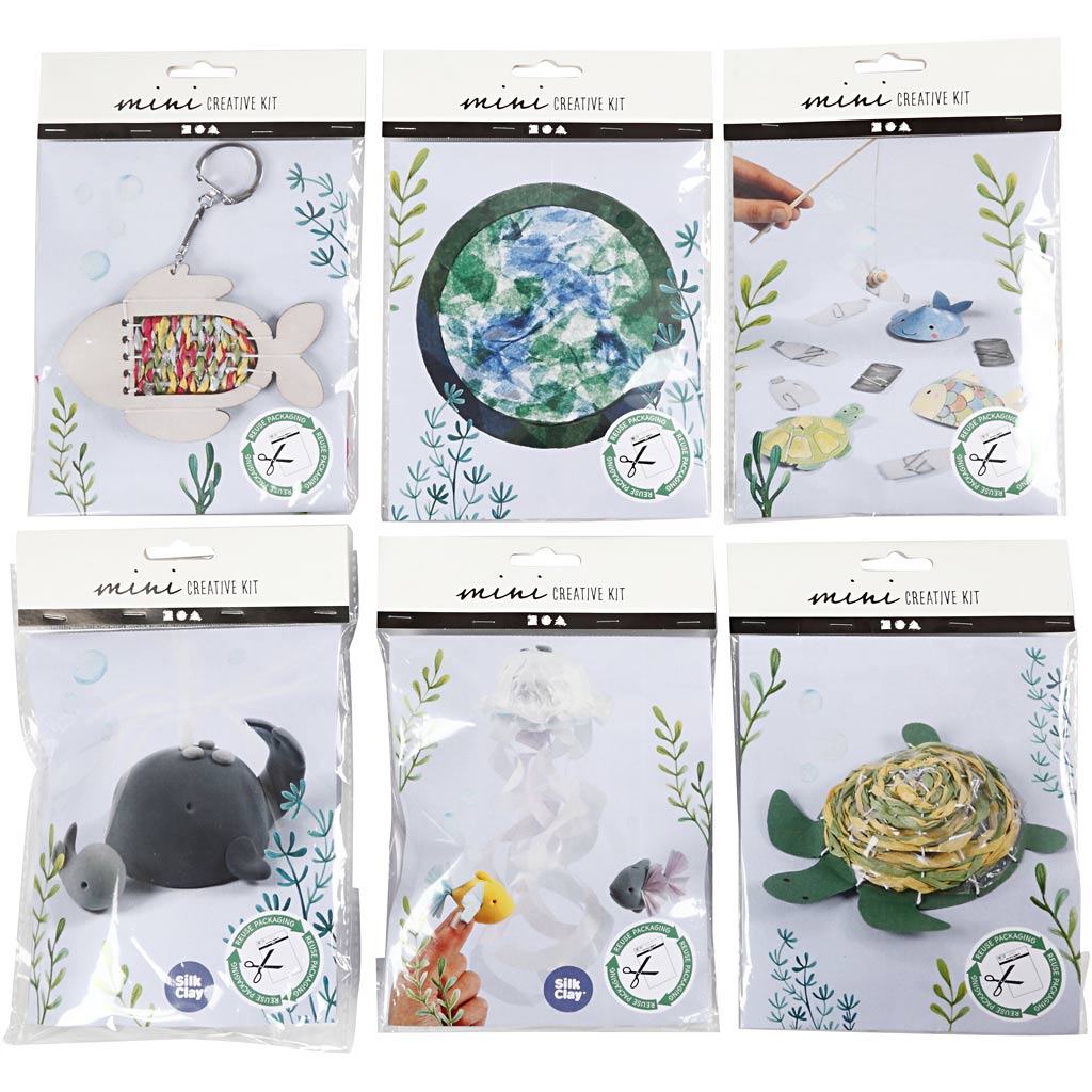 Packaging of mini creative kits with various craft items on a white background