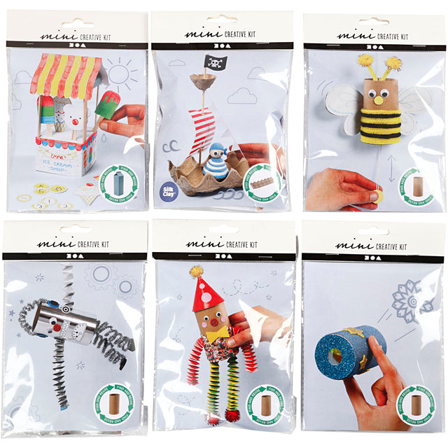 Packaging of mini creative kits with various craft items on a white background