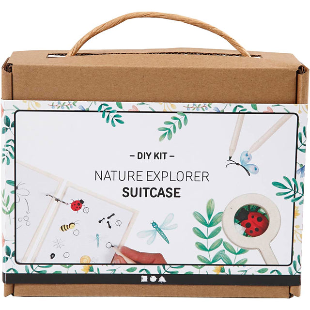 Nature explorer suitcase DIY kit packaging with illustrations of nature-themed items.