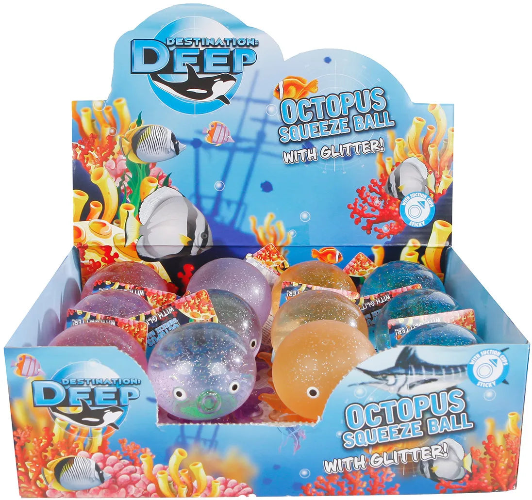 A retail display box filled with octopus squeeze balls. The display features colorful underwater-themed graphics with fish and coral, and the text 'DEEP WATER OCTOPUS SQUEEZE BALL WITH GLITTER!'.