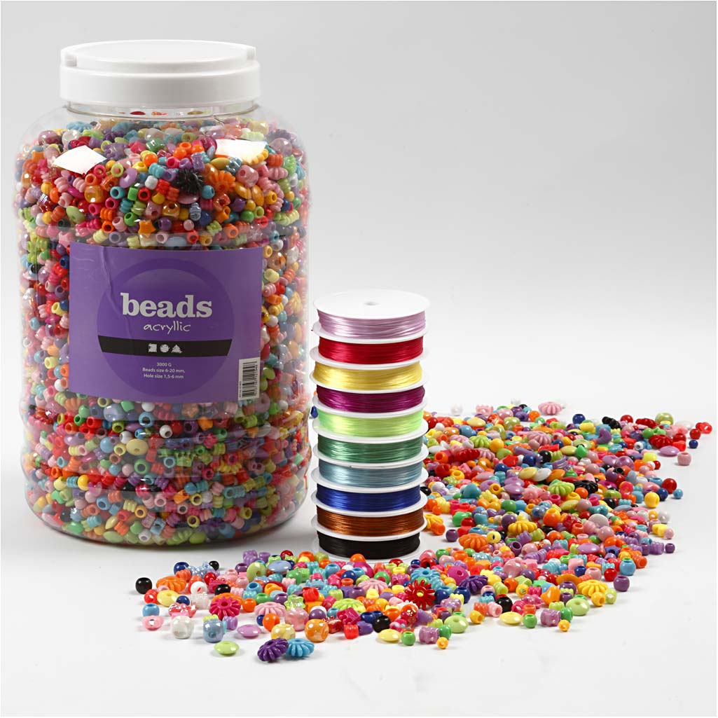 Large container of colorful beads with a smaller stack of cord on a white background