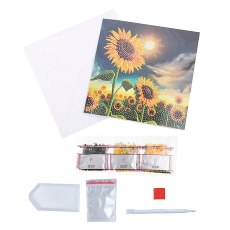 Sunflower-themed diamond painting kit with tools on a white background
