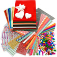 Assorted craft supplies including paper, stickers, and embellishments on a white background