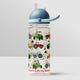 Children's water bottle with tractor pattern on a light gray background