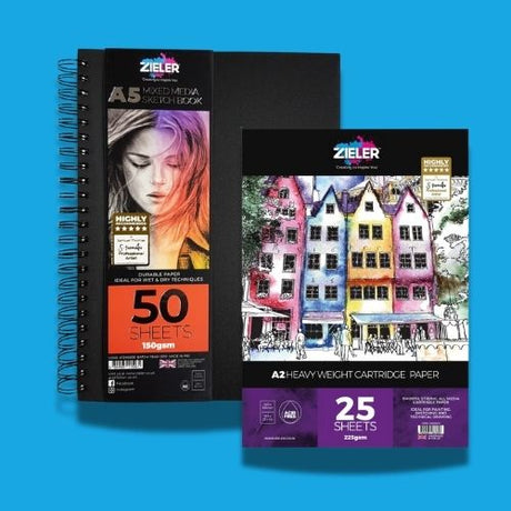 Two paper pads for different art mediums by Zieler on a blue background