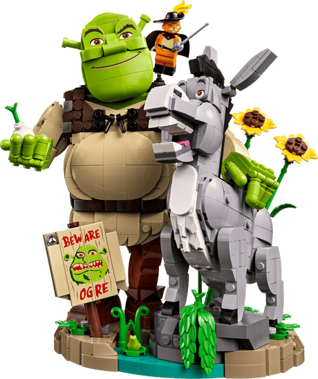 Toy figure of Shrek and Donkey with a donkey robot, on a green background