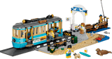 LEGO model of a tram and station with people and animals on a transparent background