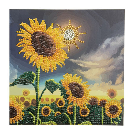 Sunflower painting with a mountain and cloud background