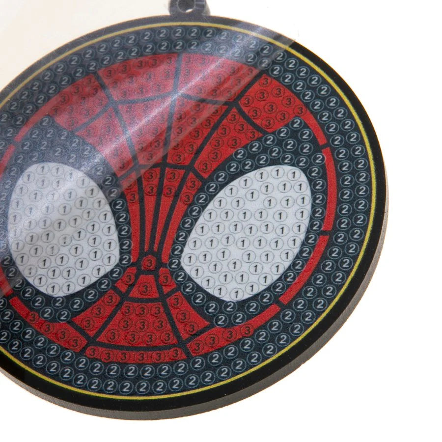 Circular object with spider web design and numbers on a white background