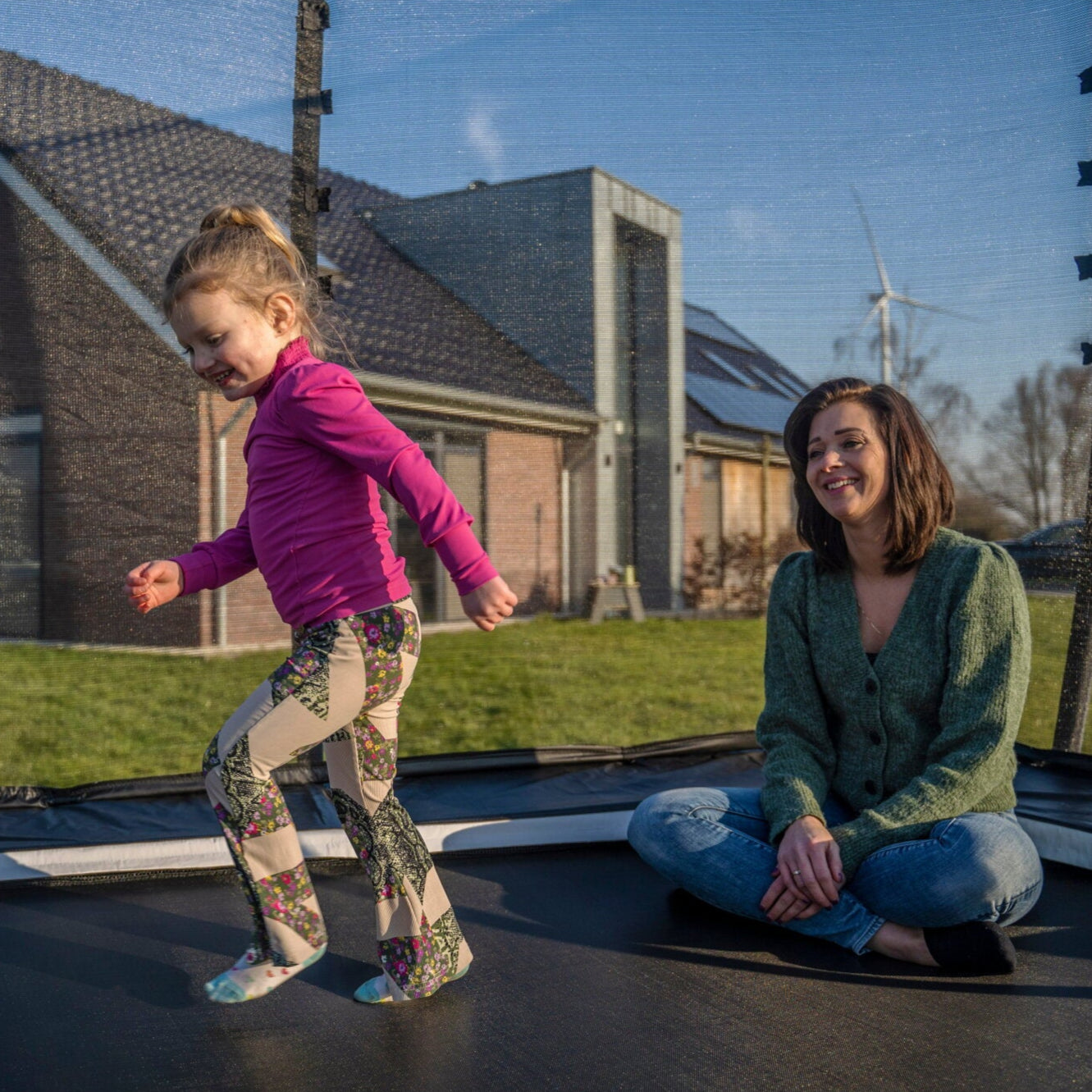 Exit Allure Classic Rectangular Trampoline with Safety Net in the garden