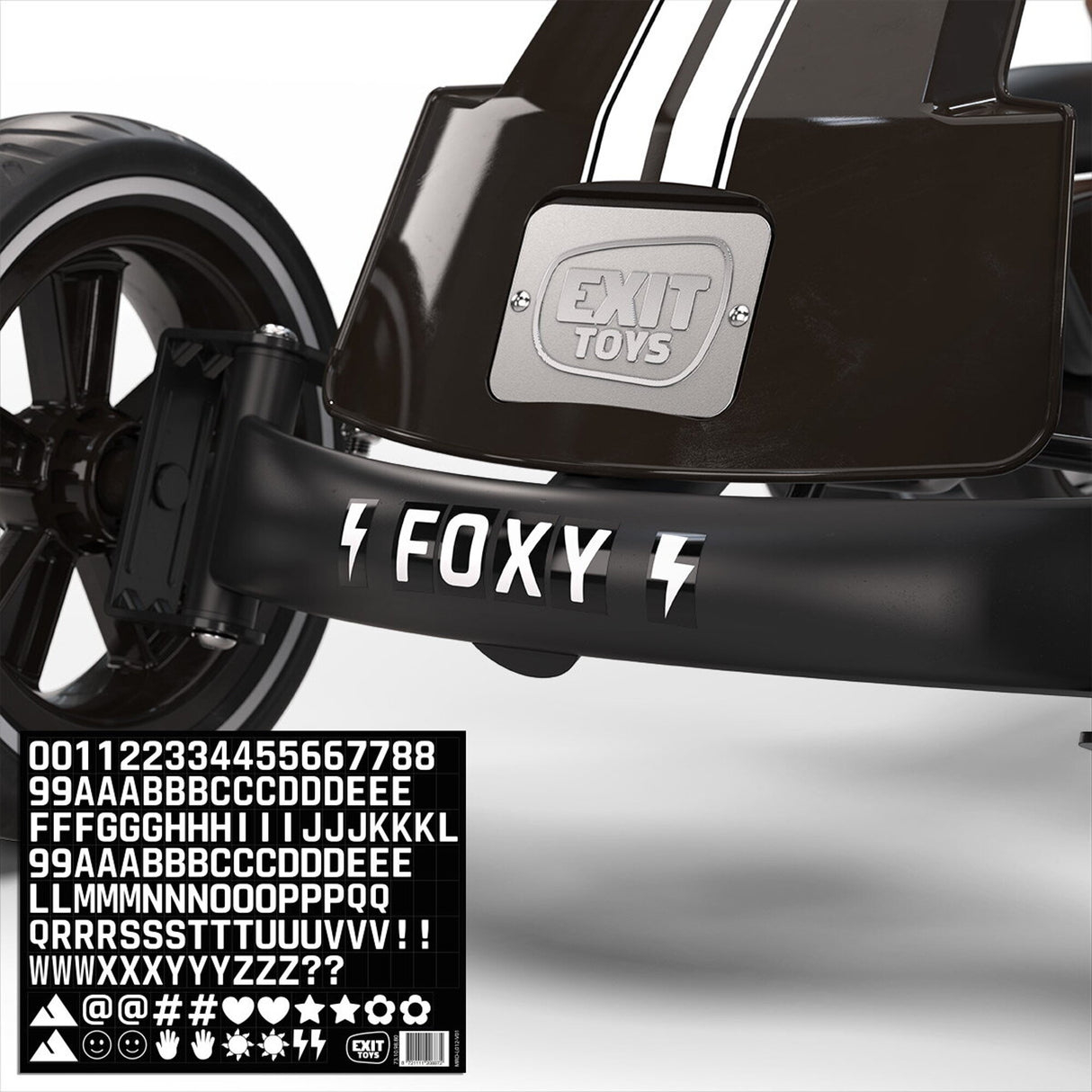 Close-up of a black cart with 'EXIT TOYS' branding and 'FOXY' branding.