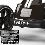 Close-up of a black cart with 'EXIT TOYS' branding and 'FOXY' branding.