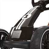Close-up of a black and brown go kart with 'EXIT' branding on a white background