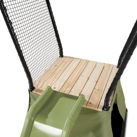 Children's play structure with wooden platform and green slide on a white background