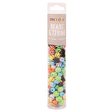 Tube of colorful beads and string with Playbox branding on a white background