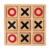 Wooden tic-tac-toe game with red and black symbols on a white background