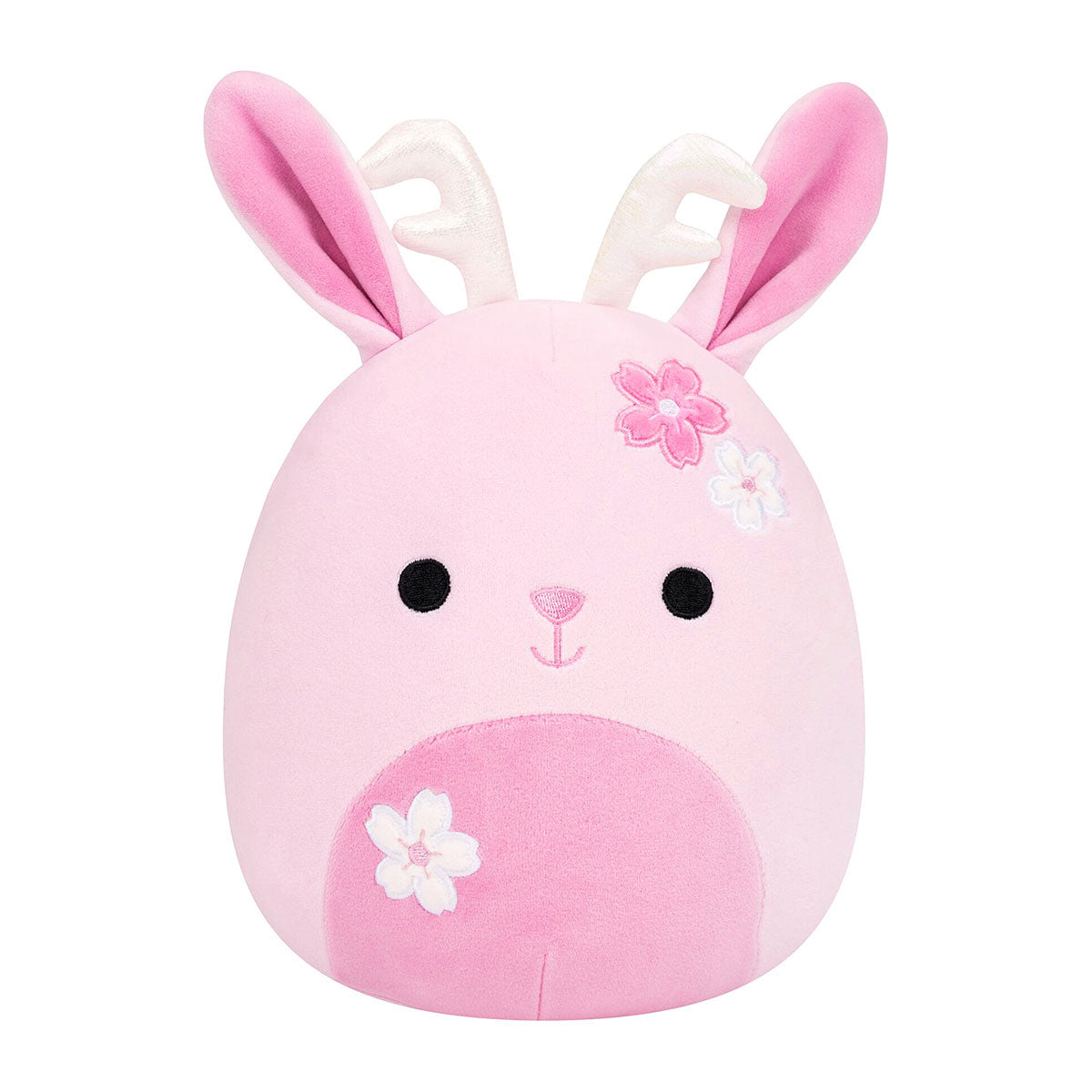 A pink plush bunny toy with long pink ears, white inner ears, embroidered black eyes, a small pink stitched nose, and white and pink flower accents on the head and snout, shown on a plain white background.