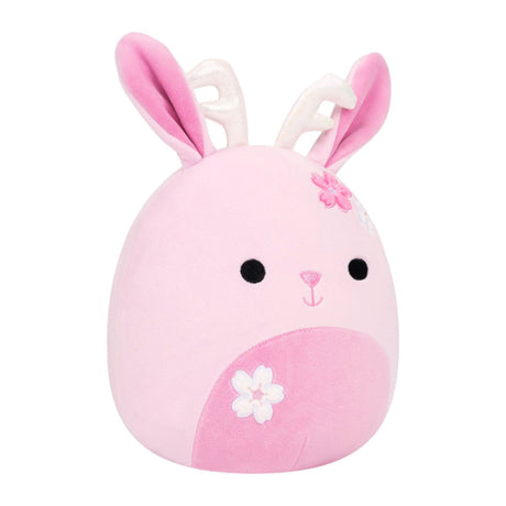 A pink plush bunny toy with white inner ears, embroidered black eyes, a small pink nose, a pink flower on the head, and a white flower on the belly, shown on a plain white background.