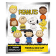 Peanuts figural bag clip in its retail packaging, featuring multiple cartoon character designs including Snoopy, Woodstock, Charlie Brown, and others on a white background with a yellow warning label at the bottom.