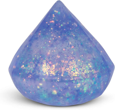 Teardrop-shaped object with iridescent glitter on a white background