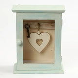 Key cabinet of wood 