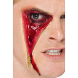 ZIP FACE SCAR, FLESH, LATEX